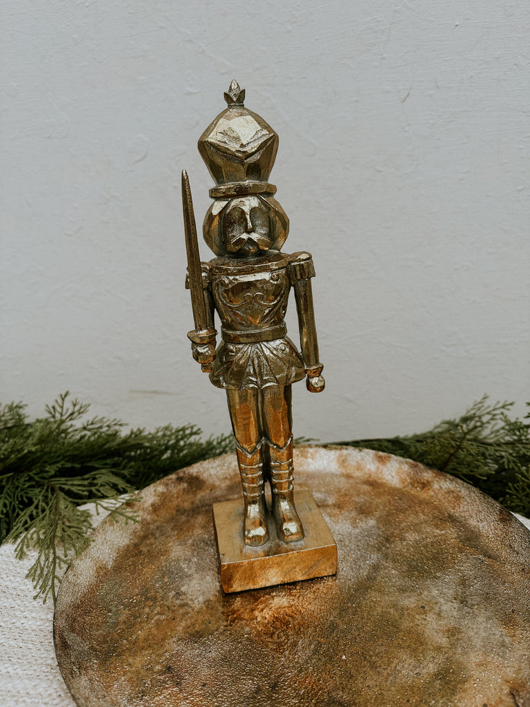 Gold nutcracker figurine