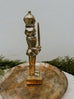 Gold nutcracker figurine
